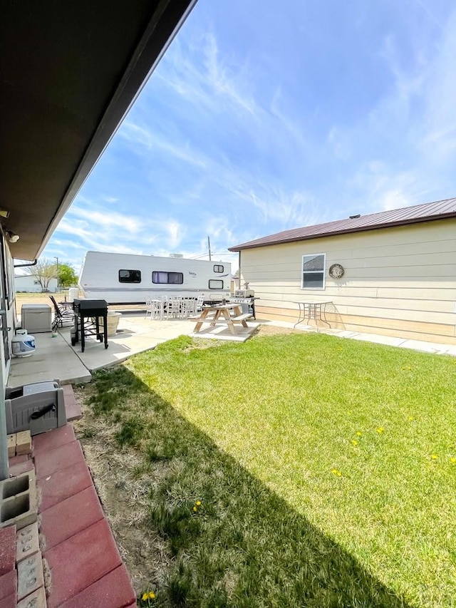 view of yard with a patio area