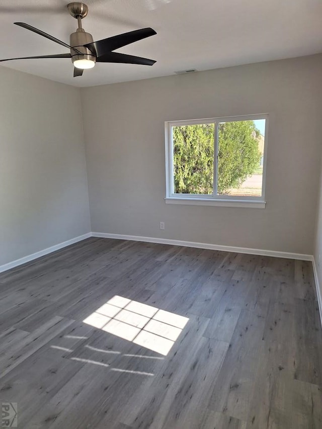 211 W Maplewood, Walsh, CO 81090 - empty room featuring baseboards, wood finished floors, and ceiling fan