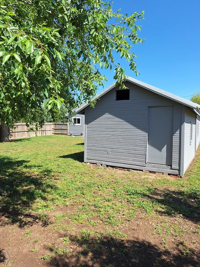 211 W Maplewood, Walsh, CO 81090 - rear view of house with an outdoor structure
