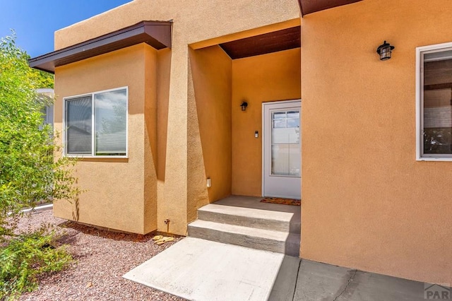 349-351 W Buttercup Way, Pueblo West, CO 81007 - entrance to property featuring stucco siding