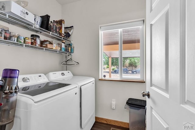 349-351 W Buttercup Way, Pueblo West, CO 81007 - laundry area with washing machine and clothes dryer and wood finished floors