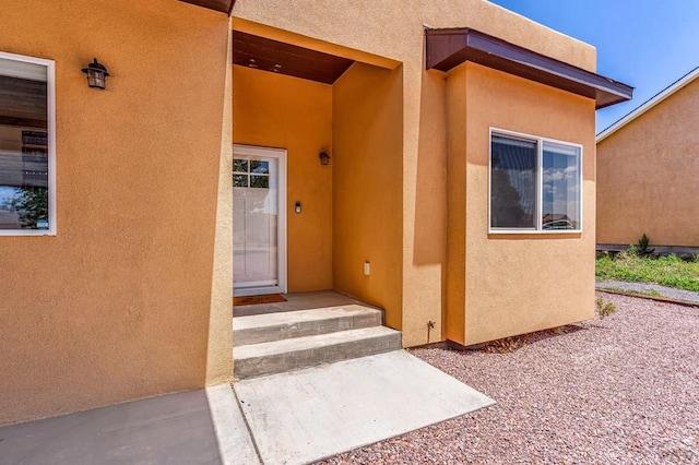 349-351 W Buttercup Way, Pueblo West, CO 81007 - property entrance with stucco siding