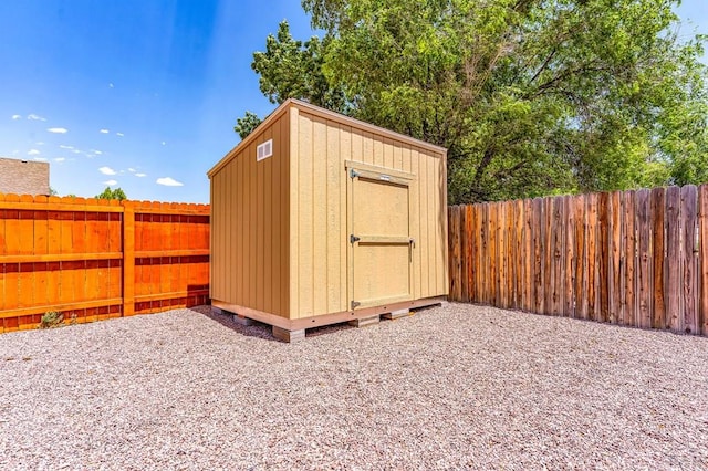 349-351 W Buttercup Way, Pueblo West, CO 81007 - view of shed featuring a fenced backyard