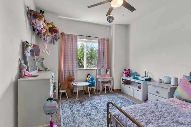 349-351 W Buttercup Way, Pueblo West, CO 81007 - carpeted bedroom with baseboards and a ceiling fan