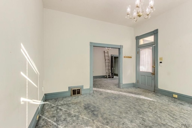 1708 Alta St, Trinidad, CO 81082 - foyer with carpet and a chandelier