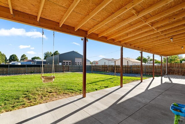 view of patio featuring a residential view and a fenced backyard