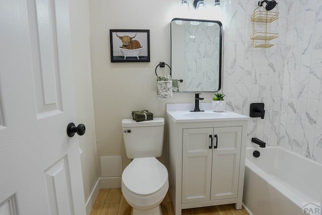 1709 Henry Ave, Pueblo, CO 81005 - bathroom with vanity, toilet, wood finished floors, and tub / shower combination