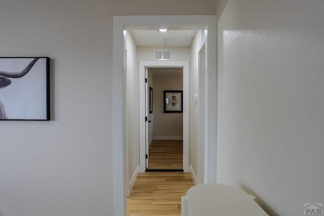 1709 Henry Ave, Pueblo, CO 81005 - hall featuring light wood finished floors and baseboards