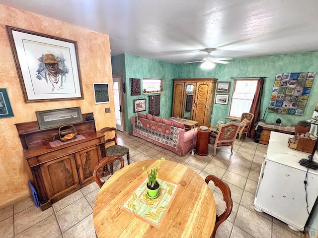 134 E Virginia Ave, La Veta, CO 81055 - living area with ceiling fan and light tile patterned flooring