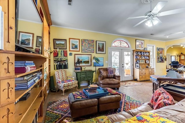 134 E Virginia Ave, La Veta, CO 81055 - living area featuring visible vents, ornamental molding, french doors, and ceiling fan