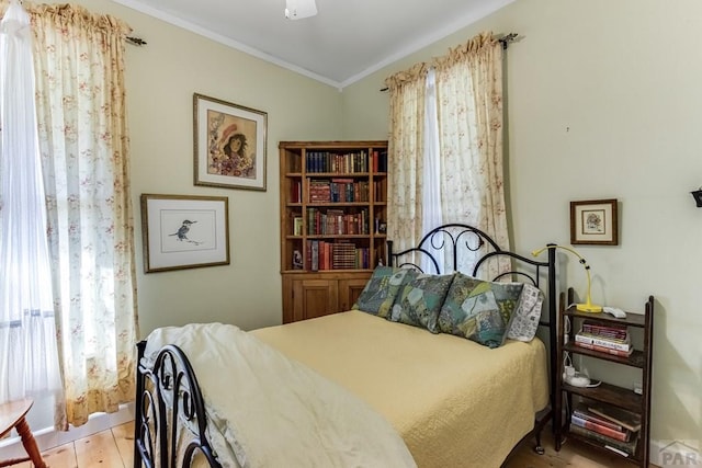 134 E Virginia Ave, La Veta, CO 81055 - bedroom featuring light wood finished floors and crown molding