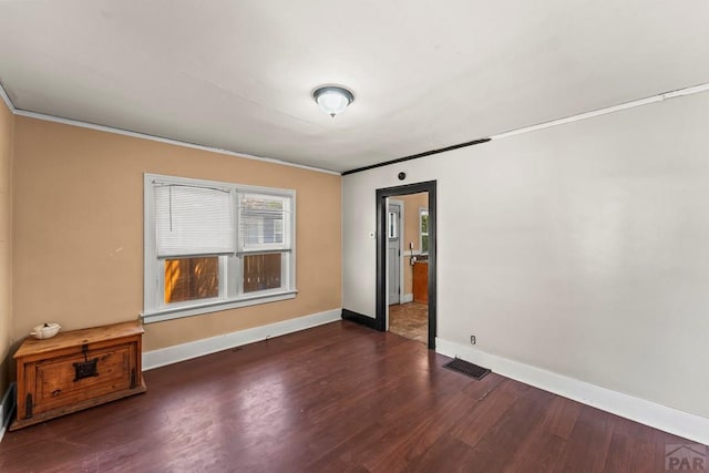 832 Berkley Ave Unit 834, Pueblo, CO 81004 - unfurnished room featuring ornamental molding and wood finished floors