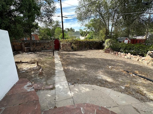 view of yard featuring fence