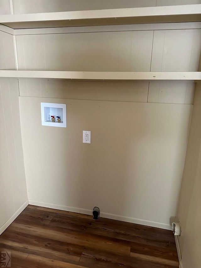 washroom featuring laundry area, baseboards, washer hookup, and dark wood-style flooring