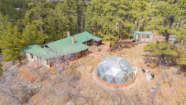 8929 Apache Dr, Beulah, CO 81023 - aerial view of property and surrounding area featuring a heavily wooded area