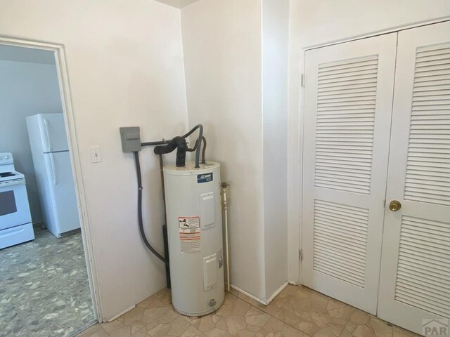 utility room with electric water heater