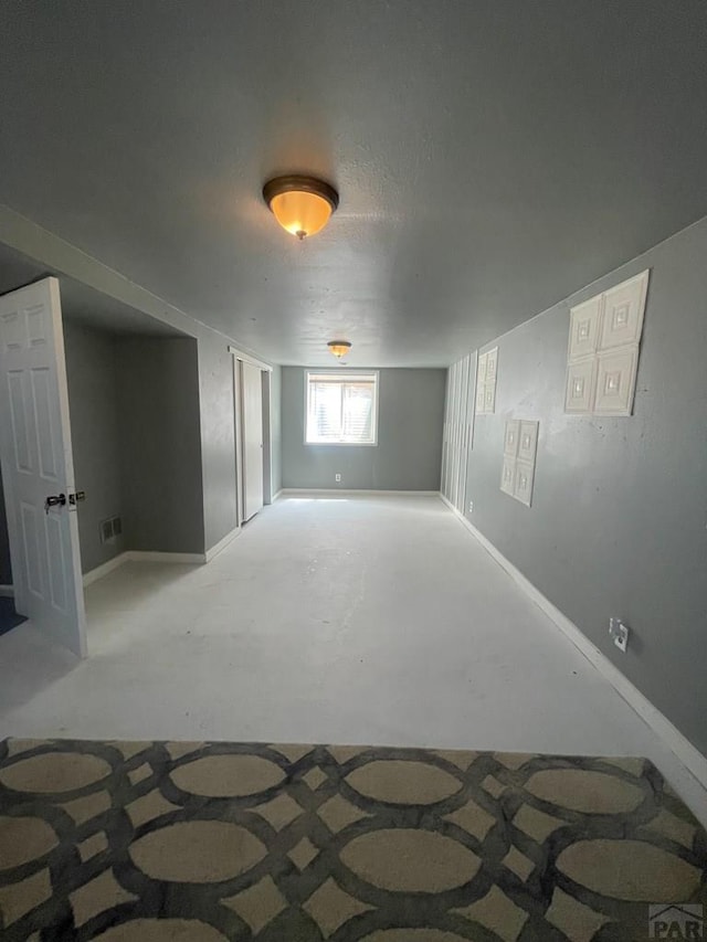 15 E 8th St, La Junta, CO 81050 - below grade area featuring baseboards