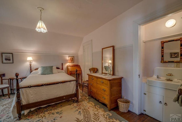 314 S Main St, La Veta, CO 81055 - bedroom with lofted ceiling and wood finished floors