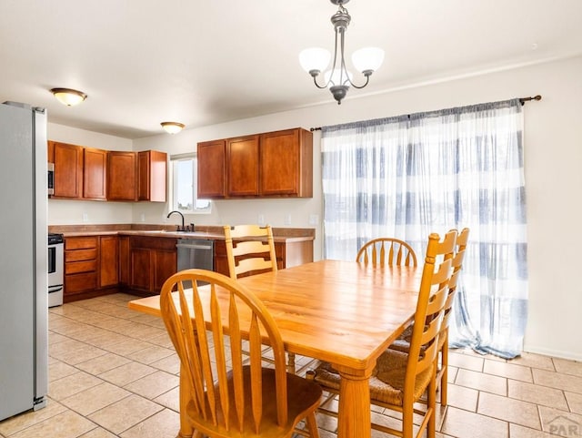 dining room featuring light tile patterned flooring
