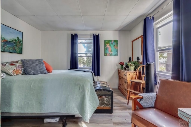 bedroom with light wood finished floors