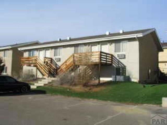 back of house with stairway