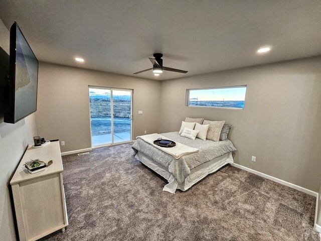 bedroom featuring access to outside, recessed lighting, dark carpet, and baseboards