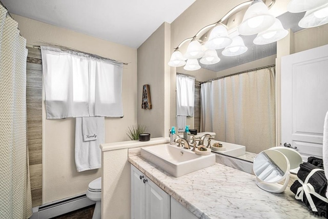 67 Macarthur Rd, Pueblo, CO 81001 - bathroom with baseboard heating, vanity, and a shower with curtain