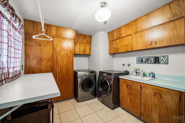 67 Macarthur Rd, Pueblo, CO 81001 - washroom with cabinet space, washing machine and dryer, and light tile patterned floors