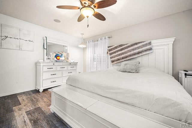 67 Macarthur Rd, Pueblo, CO 81001 - bedroom with dark wood-style floors and a ceiling fan