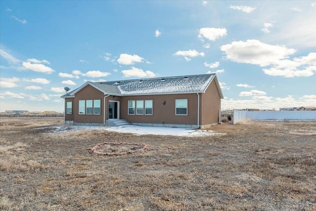 rear view of property with a patio area