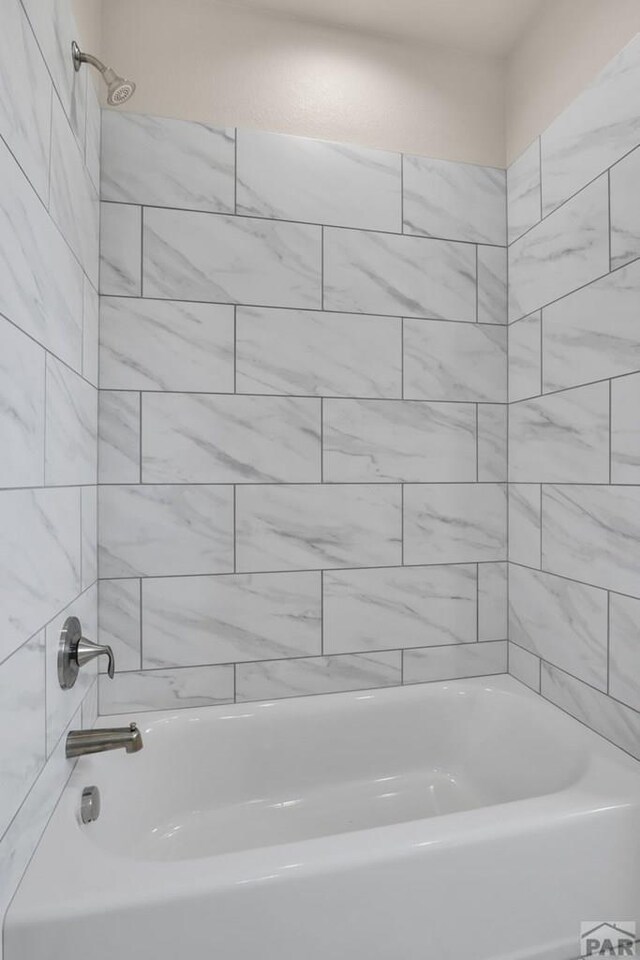 full bathroom with shower / bathtub combination