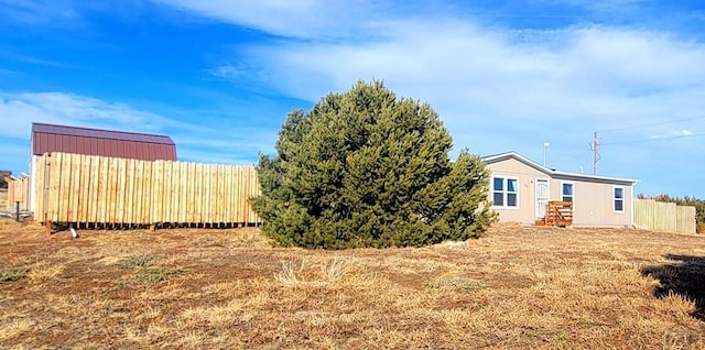 view of yard featuring fence