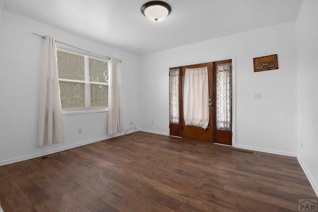 1142 Elm St, Pueblo, CO 81004 - foyer with wood finished floors and baseboards