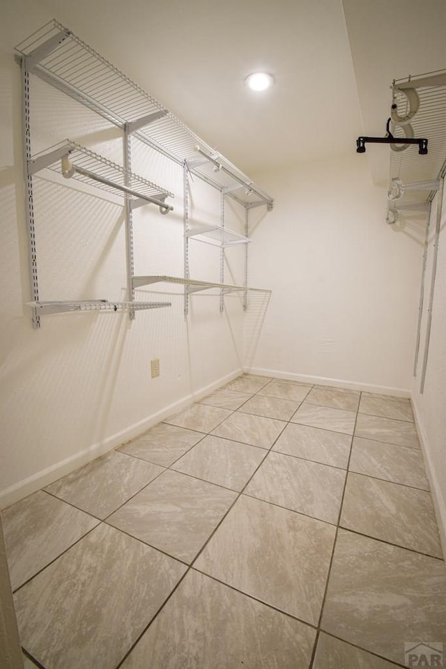 1142 Elm St, Pueblo, CO 81004 - spacious closet with light tile patterned floors