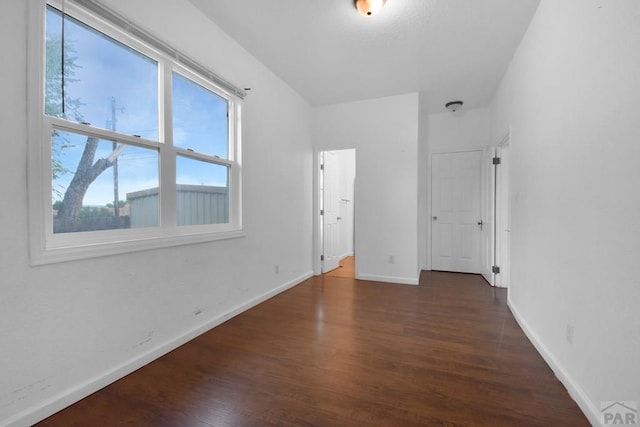 1142 Elm St, Pueblo, CO 81004 - unfurnished bedroom with wood finished floors and baseboards