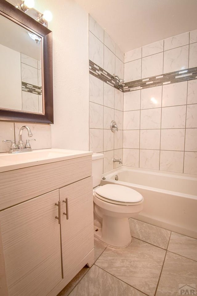 1142 Elm St, Pueblo, CO 81004 - full bath with vanity, shower / tub combination, and tile patterned floors