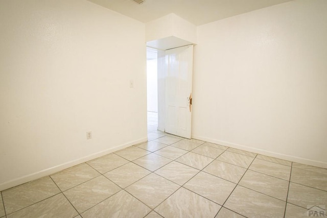 1142 Elm St, Pueblo, CO 81004 - unfurnished room with light tile patterned flooring and baseboards