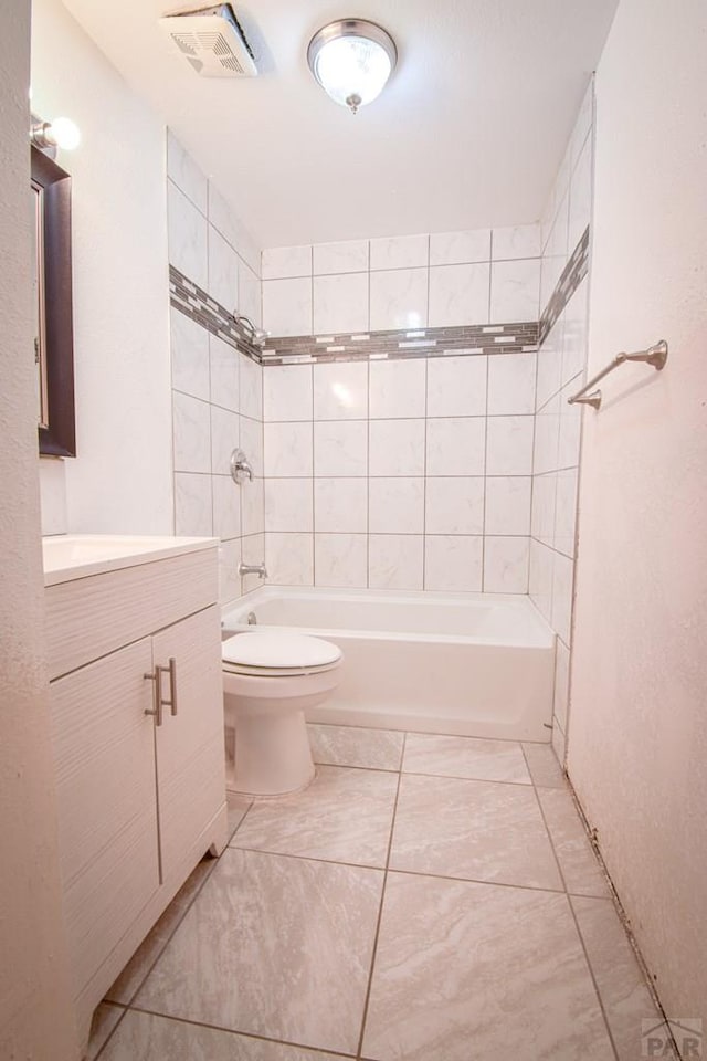 1142 Elm St, Pueblo, CO 81004 - bathroom featuring vanity, shower / bathtub combination, and tile patterned flooring