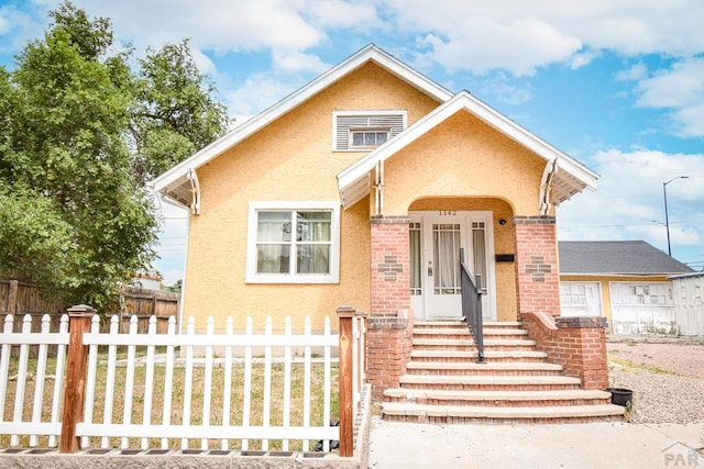 1142 Elm St, Pueblo, CO 81004 - view of front of house with stucco siding