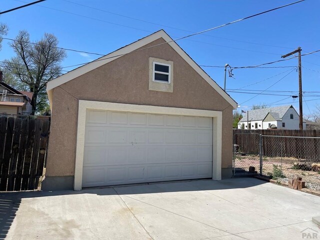 detached garage with fence