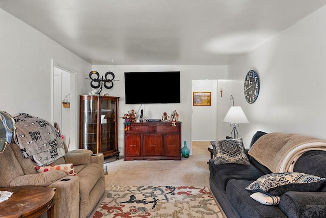 living room featuring light carpet