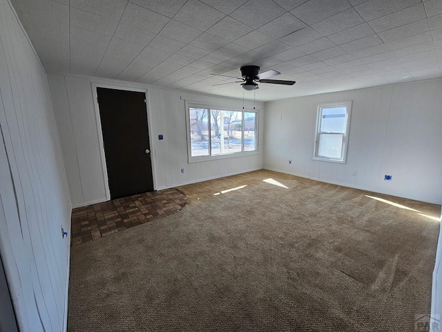 interior space featuring a ceiling fan