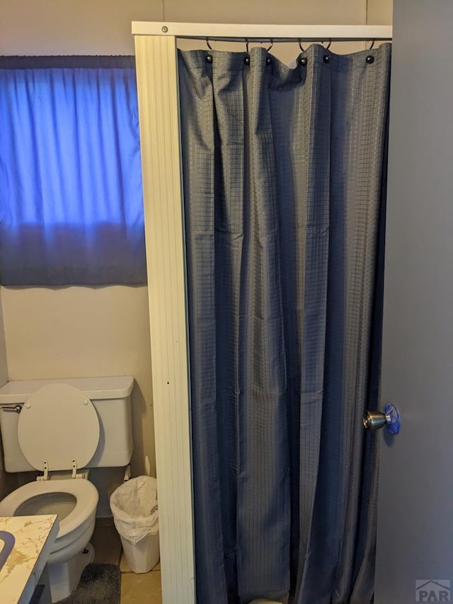 full bath featuring toilet