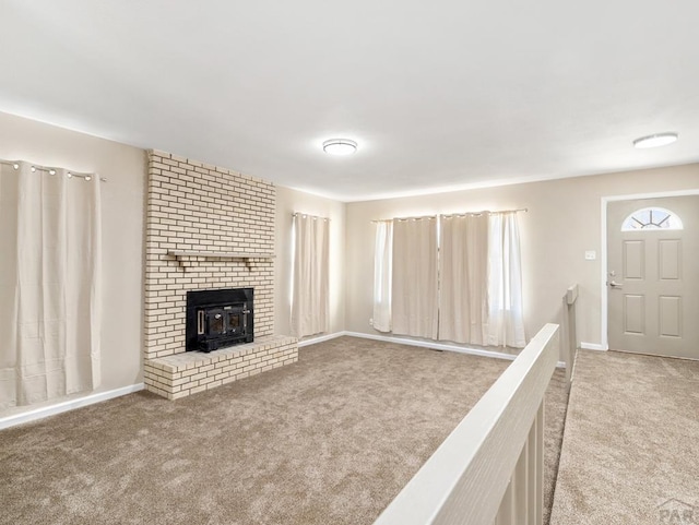 760 Crystal Ln, Pueblo, CO 81006 - unfurnished living room with light carpet and baseboards