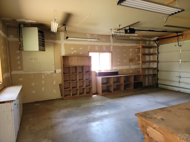 760 Crystal Ln, Pueblo, CO 81006 - garage with a heating unit and a garage door opener