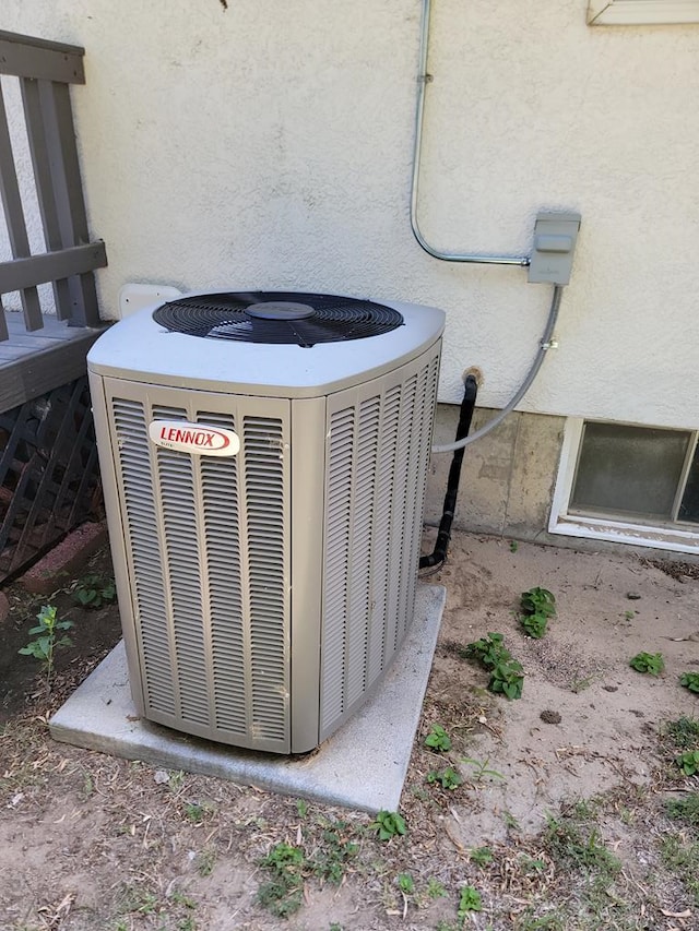 760 Crystal Ln, Pueblo, CO 81006 - details with central AC unit and stucco siding