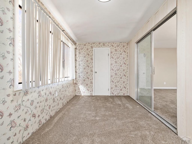 760 Crystal Ln, Pueblo, CO 81006 - unfurnished room featuring carpet flooring and wallpapered walls