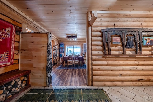 361 Crystal Peak Rd, Florissant, CO 80814 - interior space featuring wooden ceiling, log walls, and wood finished floors