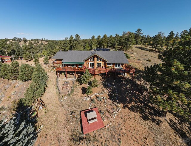 361 Crystal Peak Rd, Florissant, CO 80814 - drone / aerial view featuring a forest view