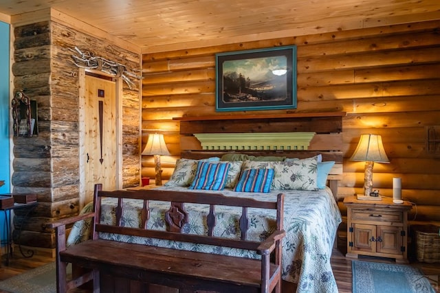 361 Crystal Peak Rd, Florissant, CO 80814 - bedroom featuring wooden ceiling, wood finished floors, and rustic walls